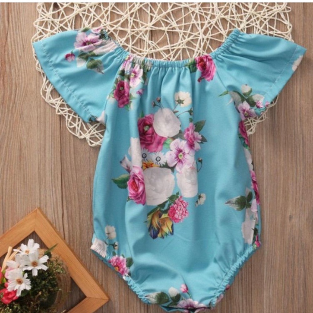 Girls Floral Romper. Size 6-12 months. New